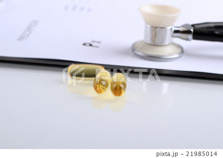 Yellow pills and phonendoscope with prescription Yellow pills and phonendoscope with prescription 21985014