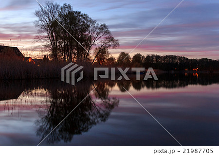trees reflection in water, landscape at night 21987705