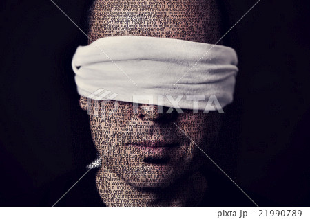 young man with a blindfold in his eyes 21990789