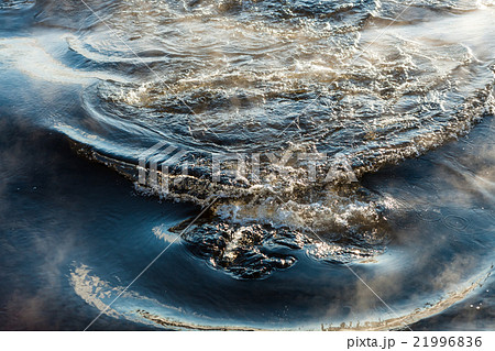 Water vapor on surface of cold water 21996836