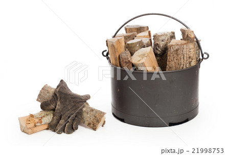 Metal basket of firewood 21998753