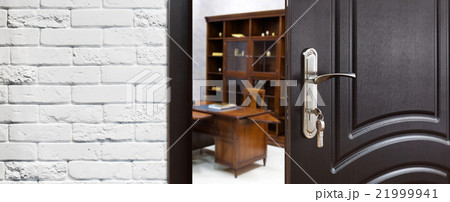 Half open door, welcome to the office. 21999941