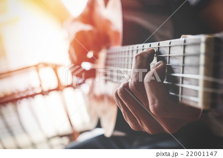 boys hand with a guitar boys hand with a guitar 22001147