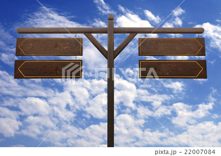 Wooden signboard for direction with blue sky Wooden signboard for direction with blue sky 22007084