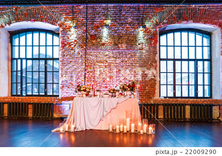 Table set for banquet in loft. Vintage room. Table set for banquet in loft. Vintage room. 22009290