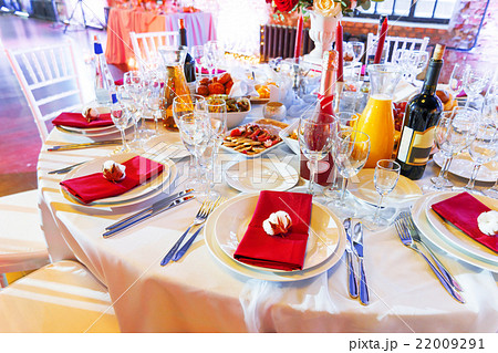Table set for banquet with cutlery. Table set for banquet with cutlery. 22009291