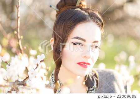 Beautiful young woman with japanese style make-up 22009688
