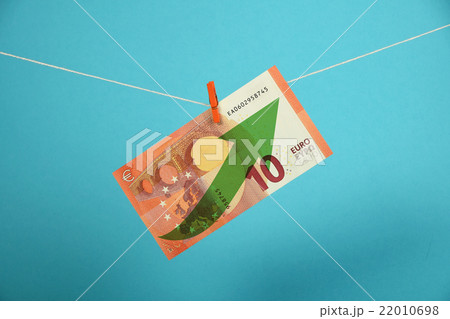 Euro currency growth illustrated over blue Euro currency growth illustrated over blue 22010698