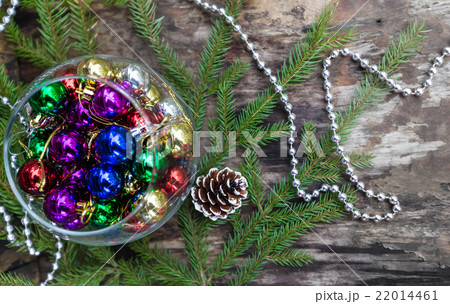 Colorful Christmas balls on wooden background Colorful Christmas balls on wooden background 22014461