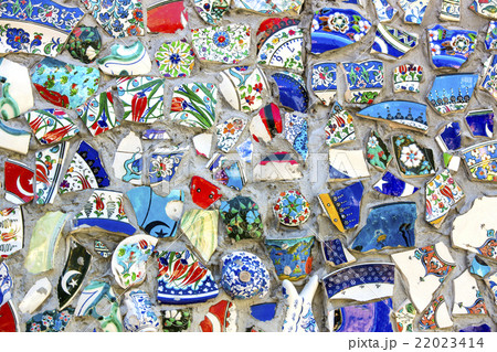 wall with broken ceramic plates colored fragments wall with broken ceramic plates colored fragments 22023414