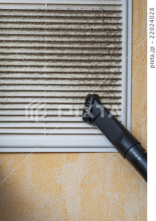 Cleaning ventilation grill with vacuum cleaner Cleaning ventilation grill with vacuum cleaner 22024028