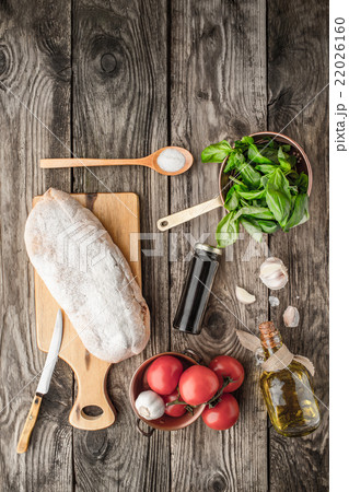 Ingredients for  bruschetta on the wooden table 22026160