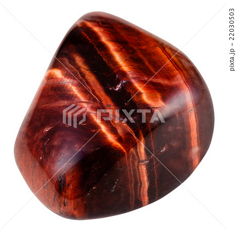 tumbled red bull-eye gemstone isolated tumbled red bull-eye gemstone isolated 22030503