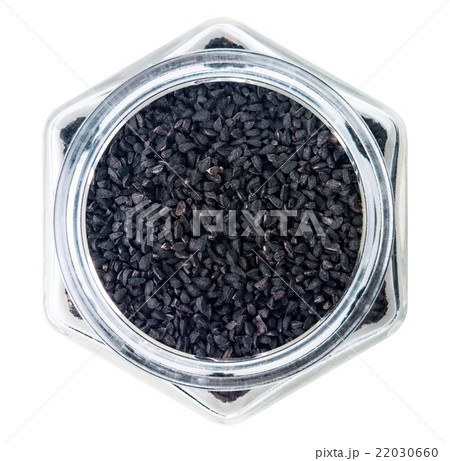 Nigella or Black cumin over white background Nigella or Black cumin over white background 22030660