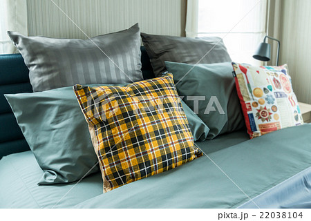 bed and pillows in bedroom bed and pillows in bedroom 22038104