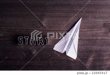 Office desk with start up sign and paper plane. Office desk with start up sign and paper plane. 22045417
