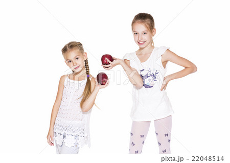 Beauty young girls with fresh apples 22048514