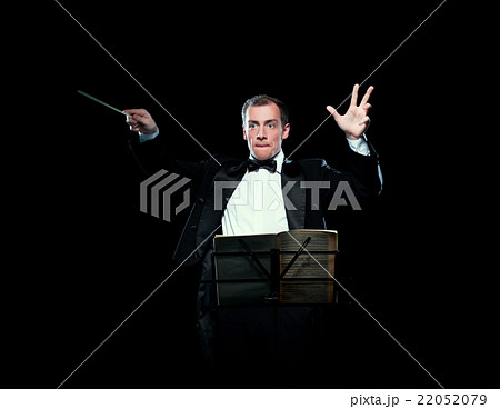 Shot of music director conducting with inspiration 22052079