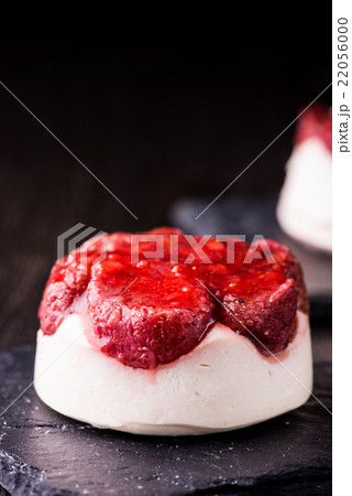 cheese dessert with strawberry on black background 22056000