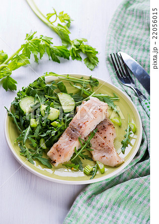 Steamed catfish filet with arugula salad 22056015