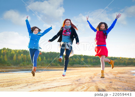 Woman in red have fun on the cost of the lake 22059443