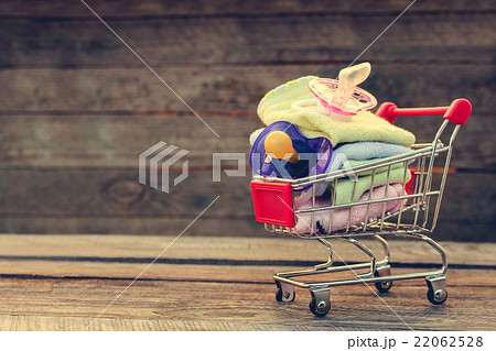 Shopping cart with clothing and baby pacifiers 22062528