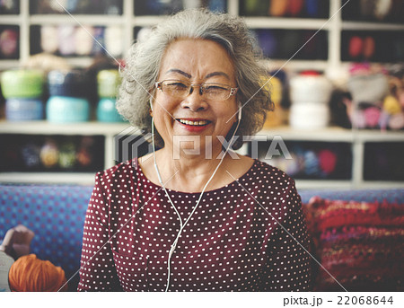 Yarn Knit Earphone Female Craft Listening Hobby Concept Yarn Knit Earphone Female Craft Listening Hobby Concept 22068644
