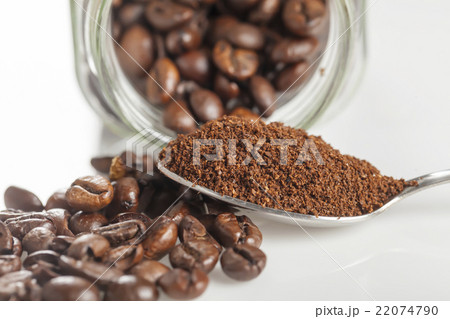 black coffee grains and Grinded black coffee grains and Grinded 22074790