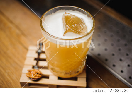 whiskey cocktail and natural ice on bar whiskey cocktail and natural ice on bar 22089280