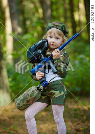girl in camouflage suit with rifle girl in camouflage suit with rifle 22092493