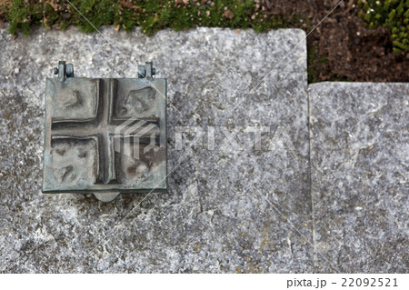 Holy water shell at the grave 22092521