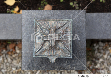 Holy water shell at the grave 22092522