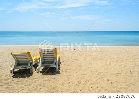 Beach chairs on White Sand Beach with blue sky Beach chairs on White Sand Beach with blue sky 22097076