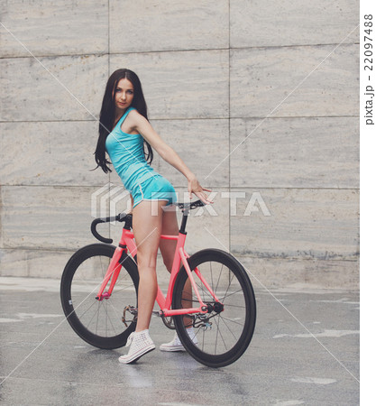 Young slim sexy sportive woman on bicycle 22097488