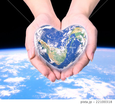 World in heart shape with over women human hand World in heart shape with over women human hand 22100318