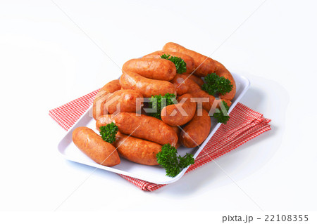 Pile of Polish sausages on plate 22108355