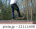 Skateboarder Freestyle at the Park Skateboarder Freestyle at the Park 22111406