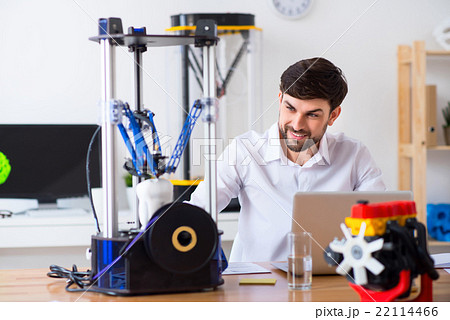 Positive man sitting at the table  22114466