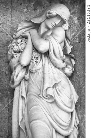 Stone statue of a grieving woman Stone statue of a grieving woman 22115331
