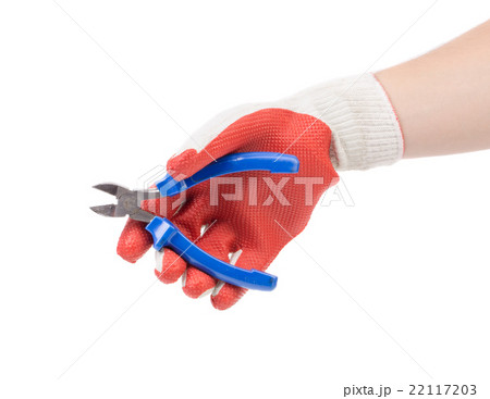 Hand in gloves holding pliers. 22117203