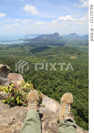 hiking legs enjoy the view on mountain peak 22119766