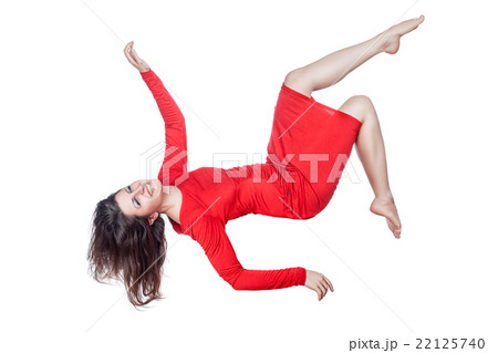 Woman in red dress laughs and falls. Woman in red dress laughs and falls. 22125740