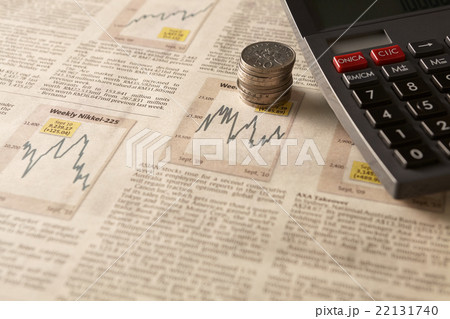 Newspaper stock market with calculator and money 22131740
