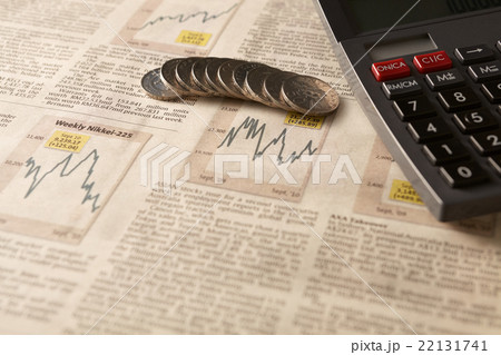 Newspaper stock market with calculator and money 22131741