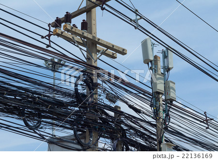 Tangled and messy electrical cables Tangled and messy electrical cables 22136169