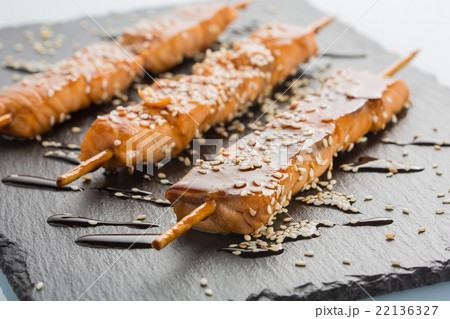 fish kebabs. on a black slate plate. 22136327