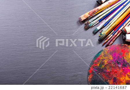 colorful paint brushes and palette 22141687