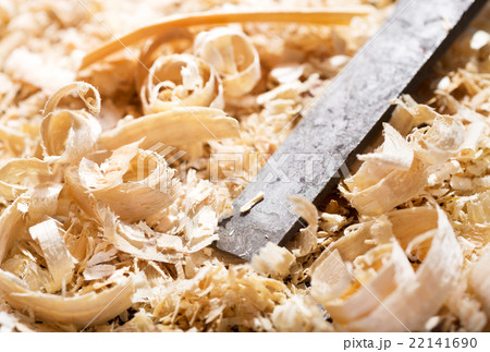 old chisel and wood shavings 22141690