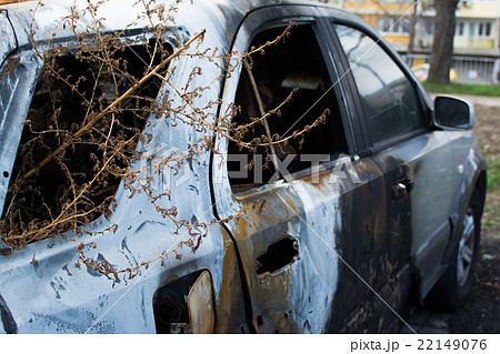 Burned gray car. Burned gray car. 22149076