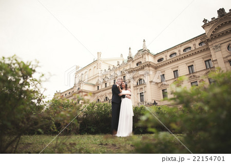 Beautiful wedding couple, bride, groom kissing and 22154701